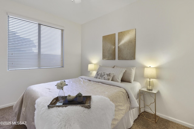 bedroom with carpet floors, ceiling fan, and baseboards