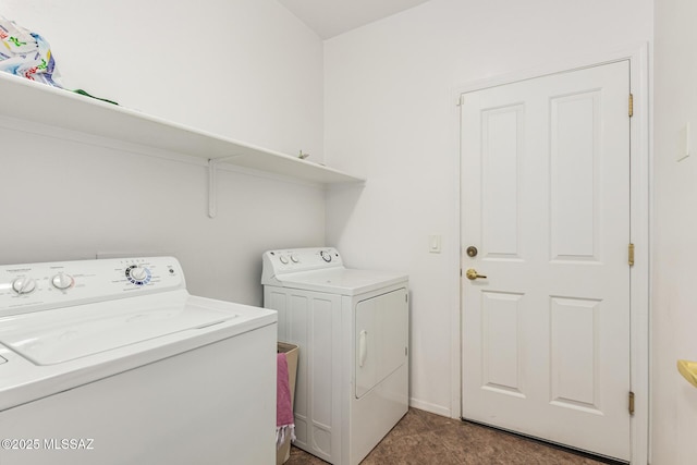 washroom featuring laundry area and independent washer and dryer