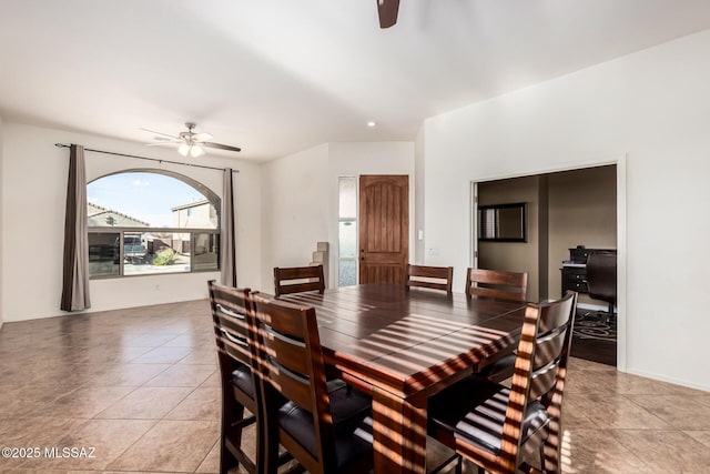 dining room featuring ceiling fan and light tile patterned floors