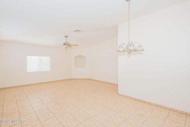 unfurnished room featuring visible vents, light tile patterned flooring, vaulted ceiling, and ceiling fan with notable chandelier