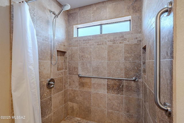 full bathroom with a shower stall