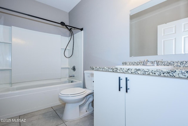 bathroom with tile patterned flooring, toilet, bathing tub / shower combination, and vanity