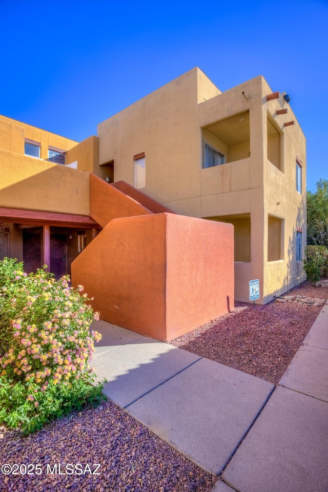 exterior space with stucco siding