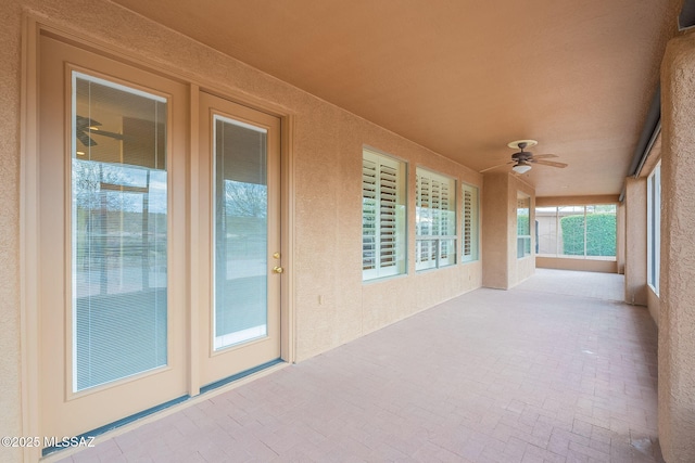 view of patio featuring a ceiling fan