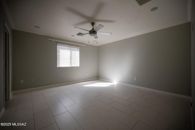 spare room with visible vents, baseboards, ceiling fan, and crown molding