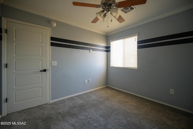 unfurnished bedroom featuring crown molding, carpet, visible vents, and baseboards