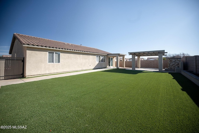 view of yard featuring a patio, a fenced backyard, and a pergola