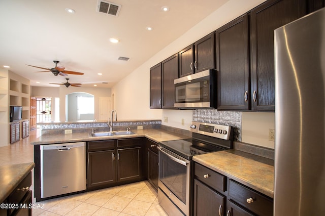 kitchen featuring ceiling fan, visible vents, a sink, and appliances with stainless steel finishes
