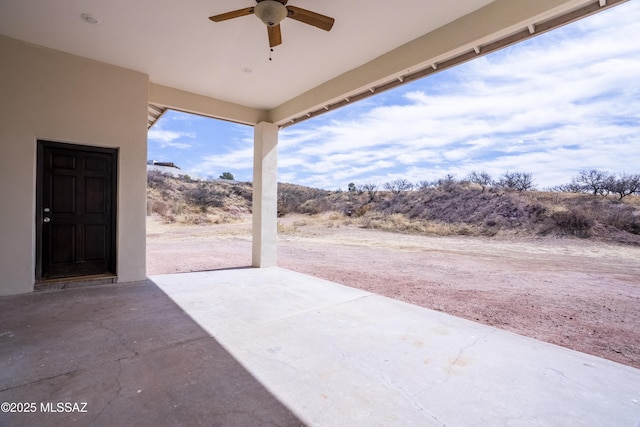 view of patio with a ceiling fan