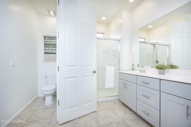 bathroom featuring a stall shower and tile patterned floors