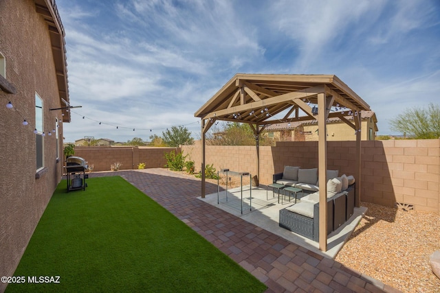 view of yard with a patio area, a fenced backyard, an outdoor hangout area, and a gazebo