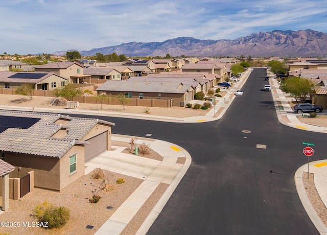 aerial view featuring a residential view and a mountain view