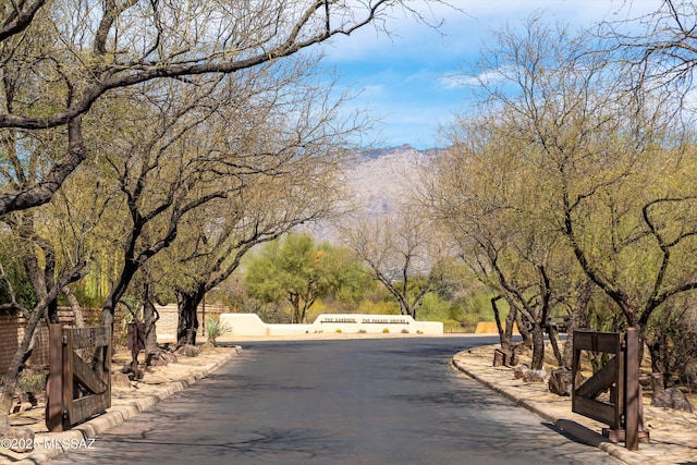 view of property's community with fence