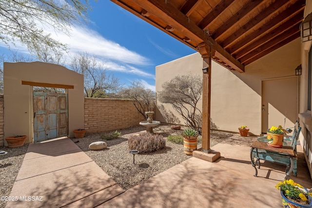 view of patio with fence