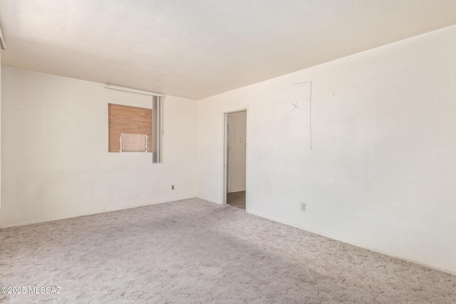 empty room with carpet flooring