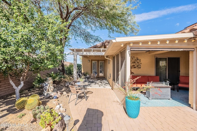 view of patio / terrace featuring an outdoor hangout area, fence, and a pergola