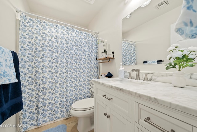 full bathroom featuring visible vents, toilet, curtained shower, tile patterned flooring, and vanity