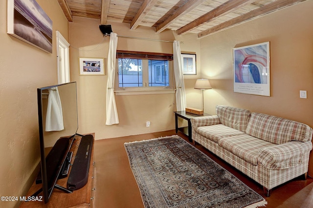 living area featuring beamed ceiling and wood ceiling