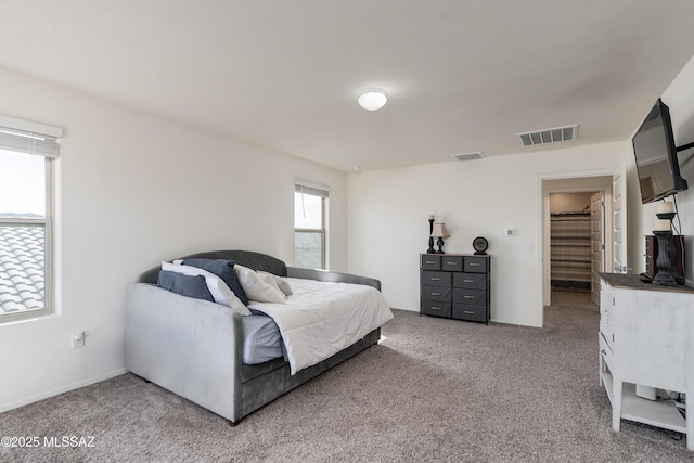 bedroom with carpet flooring and visible vents