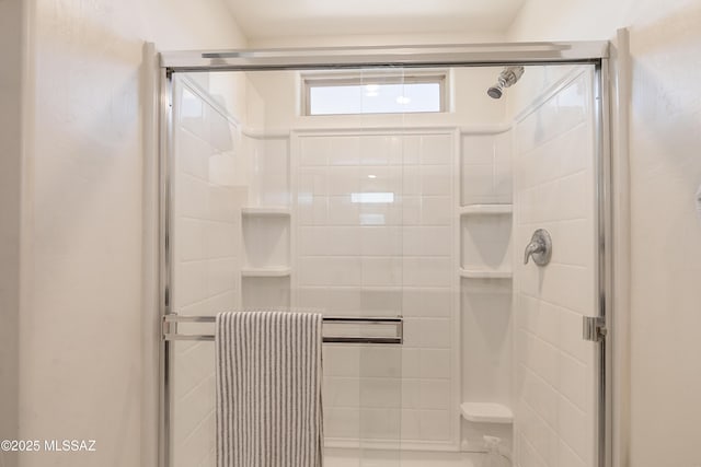 full bathroom with radiator heating unit and a stall shower