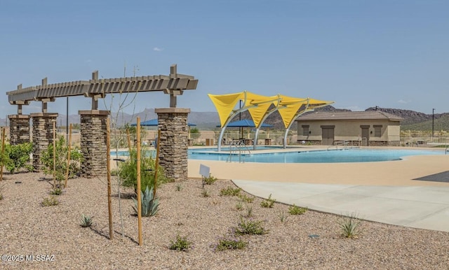 pool featuring a patio area