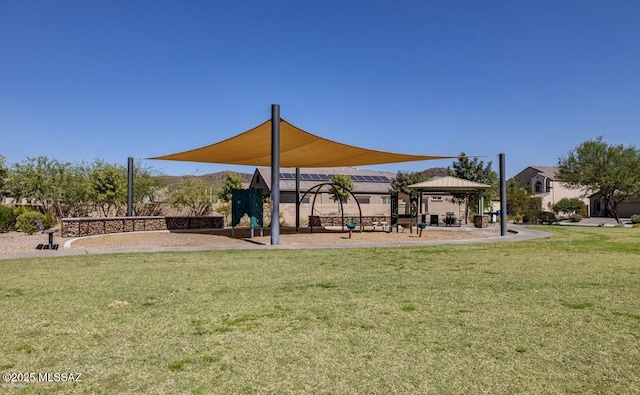 view of community with a yard and a gazebo