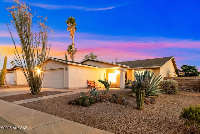 9990 E Mary Dr, Tucson, AZ 85730 - single story home featuring stucco siding, driveway, and a garage