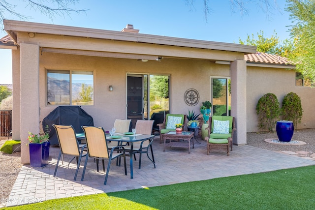 view of patio / terrace featuring fence