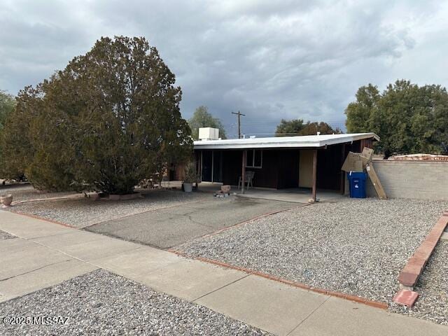 view of front of home with an attached carport