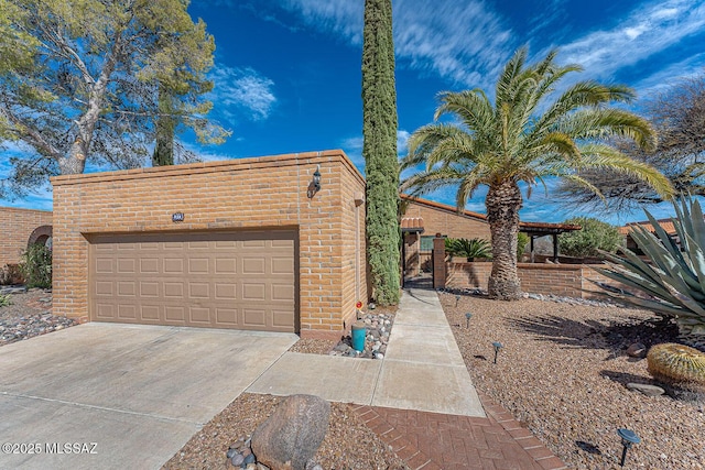 view of front of home featuring driveway and a garage