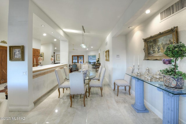 dining space featuring baseboards, visible vents, and recessed lighting