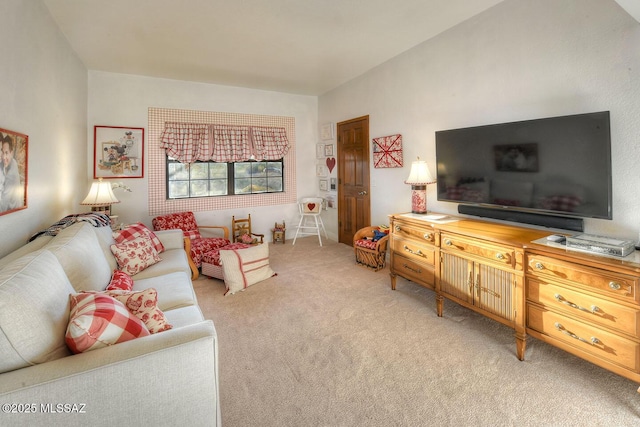 living area featuring light colored carpet