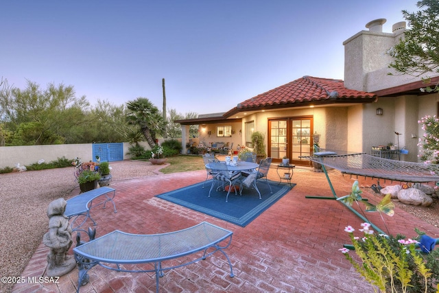 view of patio featuring french doors and mail area