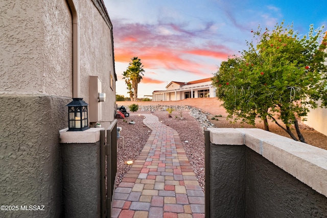 view of patio featuring fence