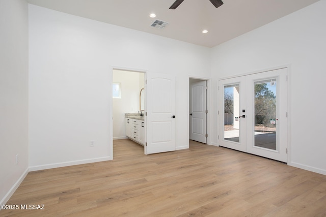 15809 N Twin Lakes Dr NW, Tucson, AZ 85739 - unfurnished bedroom with recessed lighting, french doors, light wood-style floors, access to exterior, and visible vents