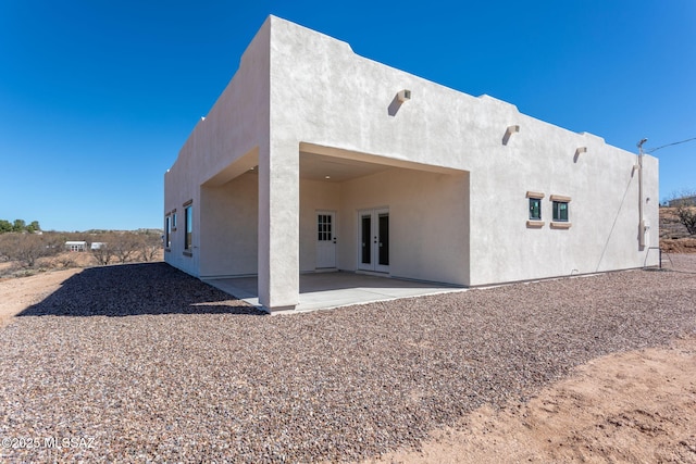 15809 N Twin Lakes Dr NW, Tucson, AZ 85739 - back of house featuring stucco siding, french doors, and a patio area