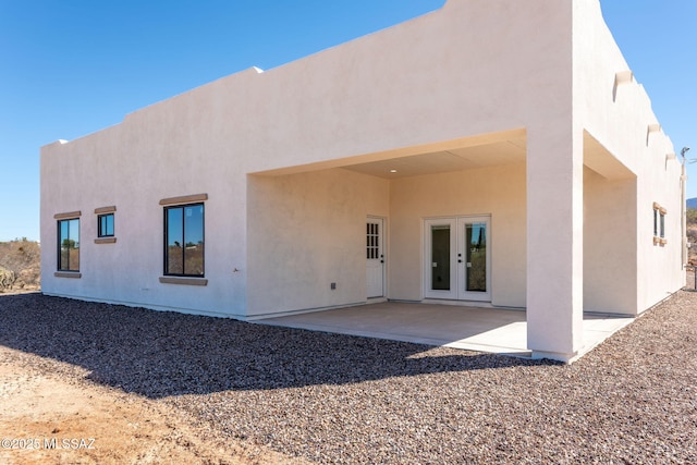 15809 N Twin Lakes Dr NW, Tucson, AZ 85739 - back of house with stucco siding, a patio, and french doors