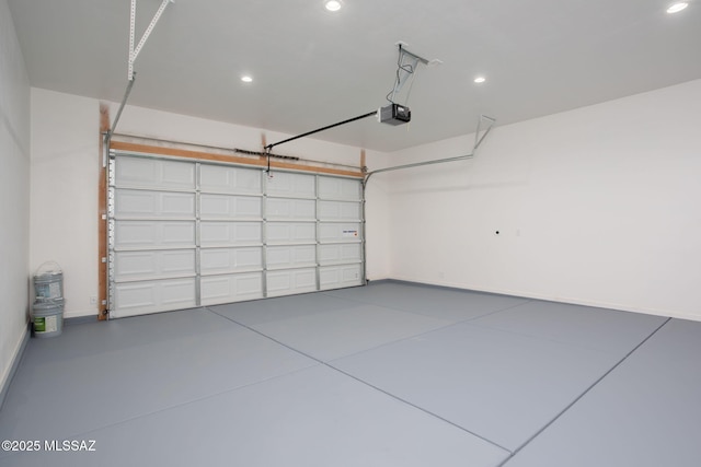 15809 N Twin Lakes Dr NW, Tucson, AZ 85739 - garage with recessed lighting, baseboards, and a garage door opener