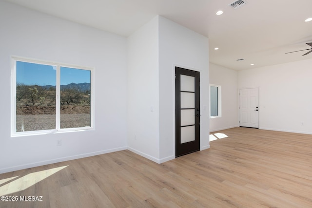 15809 N Twin Lakes Dr NW, Tucson, AZ 85739 - spare room featuring recessed lighting, light wood-type flooring, baseboards, ceiling fan, and visible vents