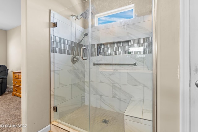 full bath featuring a shower stall