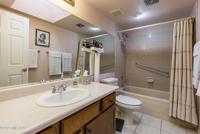 bathroom featuring tile patterned flooring, visible vents, vanity, and shower / bath combo