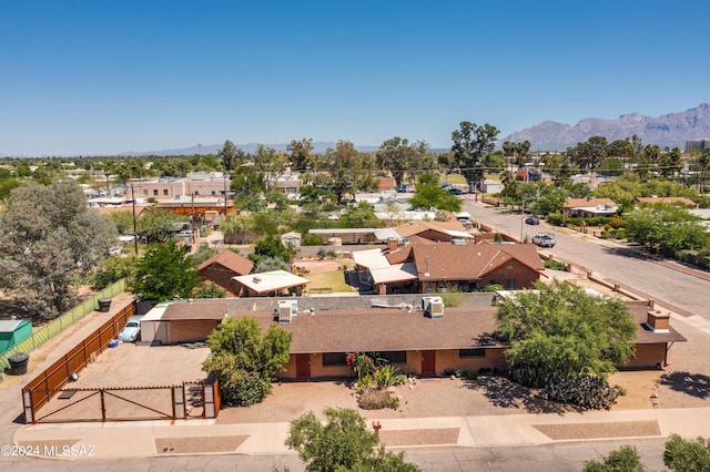 birds eye view of property with a residential view and a mountain view