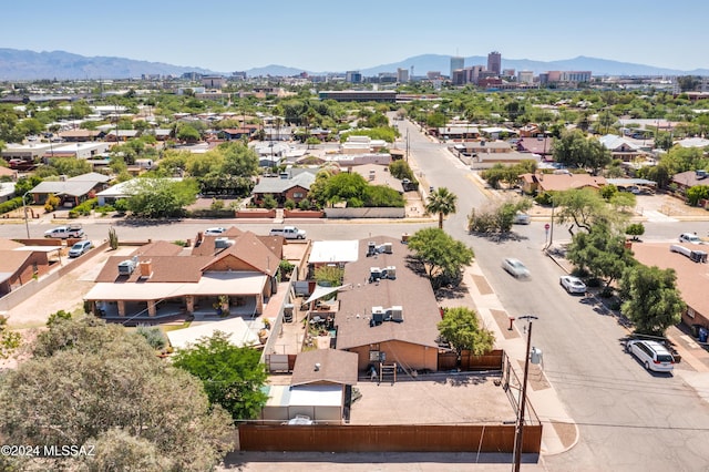 birds eye view of property with a residential view and a mountain view