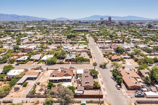 birds eye view of property with a residential view and a mountain view