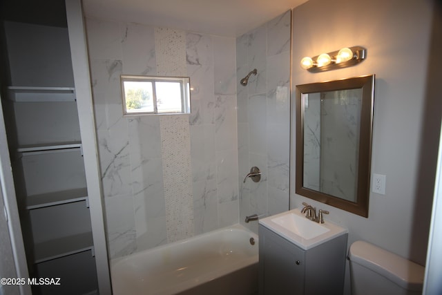 full bathroom featuring vanity, shower / tub combination, and toilet