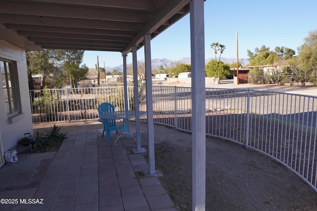 view of patio / terrace with fence