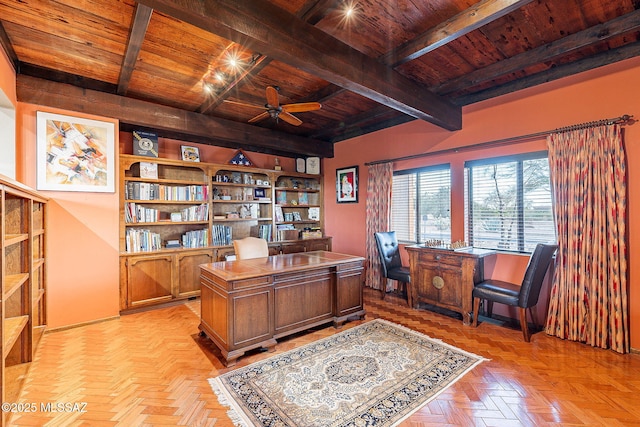 home office with wooden ceiling, beamed ceiling, and a ceiling fan