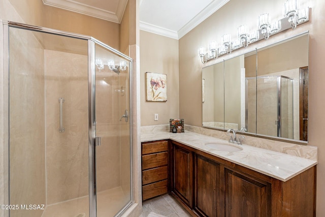 bathroom featuring a shower stall, vanity, and crown molding