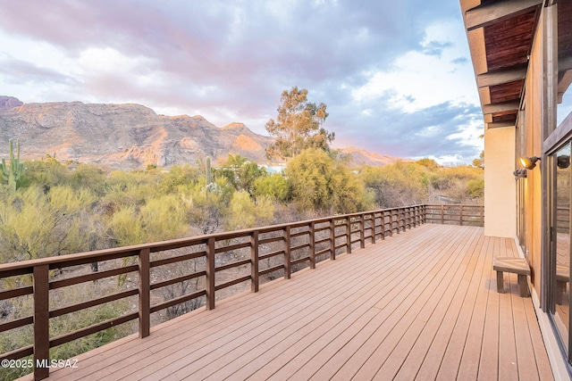 wooden terrace featuring a mountain view