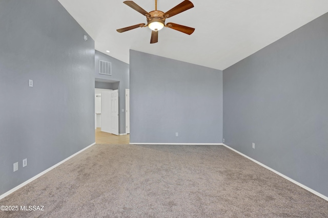 spare room featuring light carpet, baseboards, visible vents, and a ceiling fan